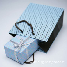 Customized wrapped paper box with ribbon with paper bag